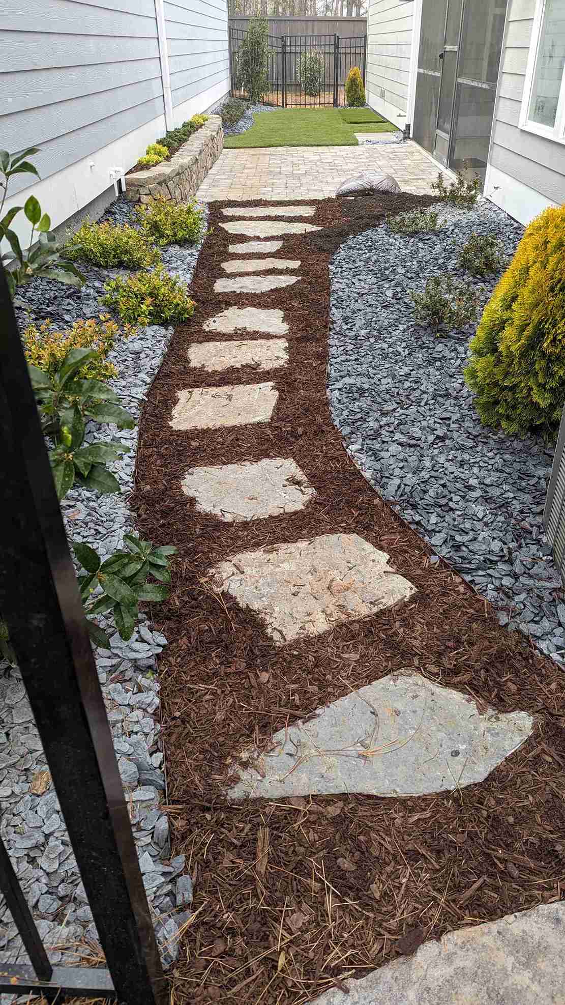 Stone retaining wall and steps