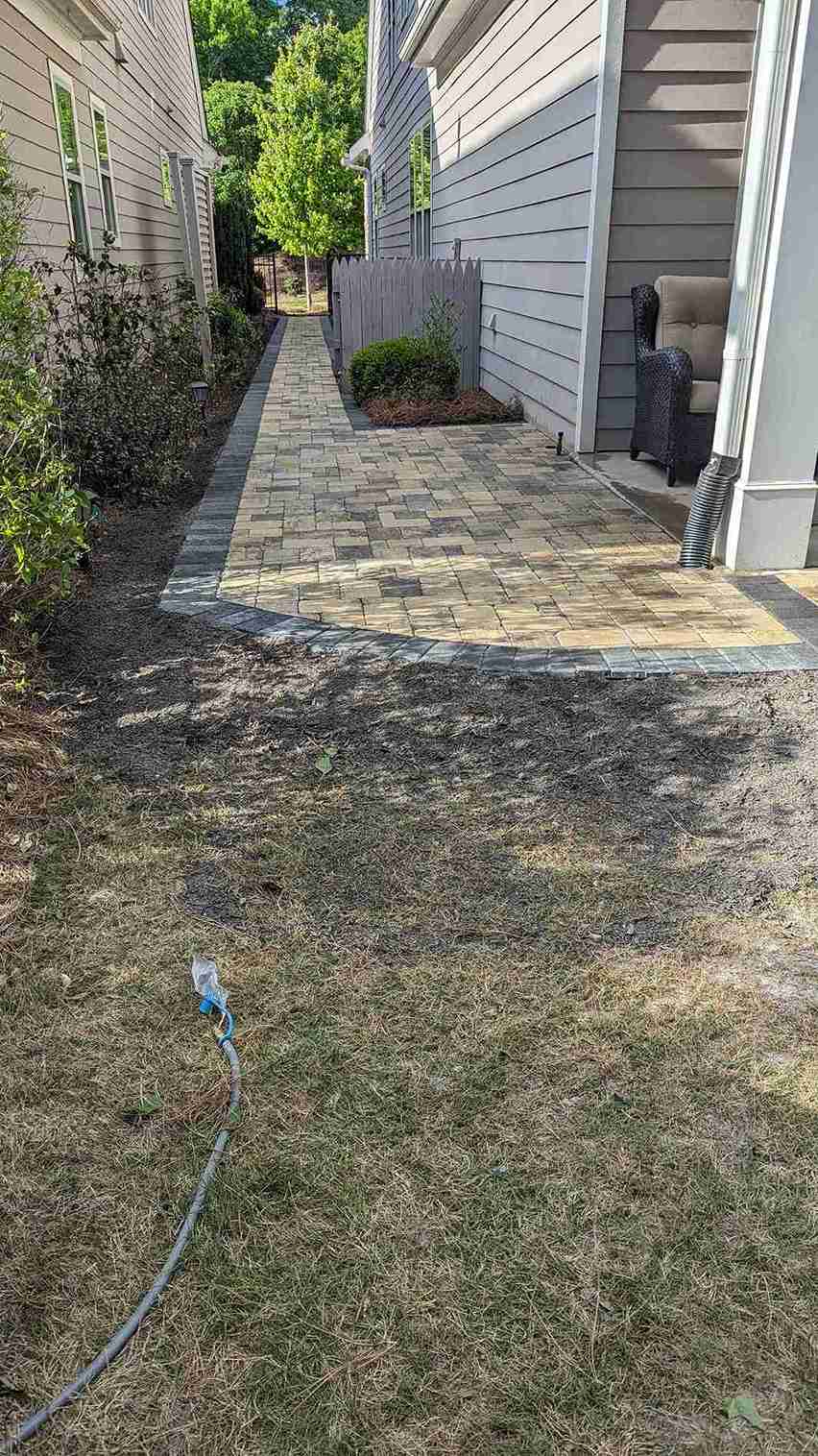 Paver driveway with contrasting stone banding